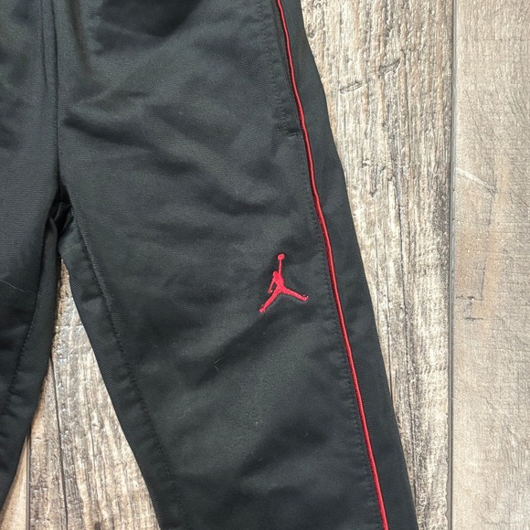 Kids Jordan Black Track Pants Red Stripe Joggers Size 4 XS - Picture 2 of 6